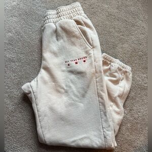 AYR Cream Joggers with Red Accents